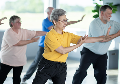 Group of people doing Tai Chi